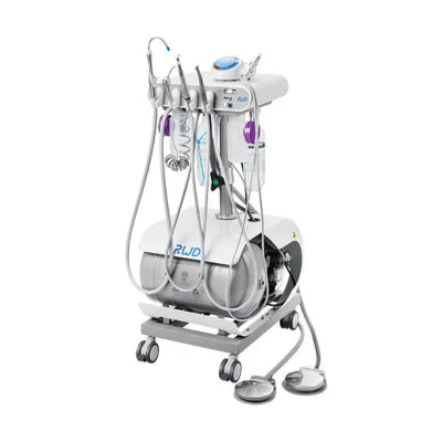 Dental chair with various dental tools on a white background